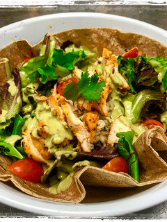 A picture of Greek Yogurt Cilantro Lime Sriracha Dressing.
