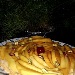 A picture of Three layers mango dessert.