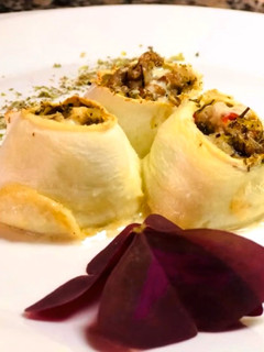 Una foto de Rollitos de zapallo rellenos