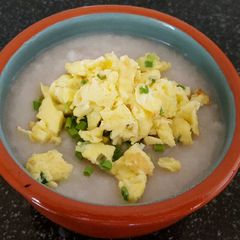 A picture of Rice congee with scrambled egg 米粥，炒鸡蛋 #chinesecooking.