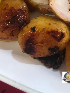 Una foto de Papas doradas al horno