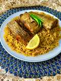 مچبوس سمك بصلصة البيستو