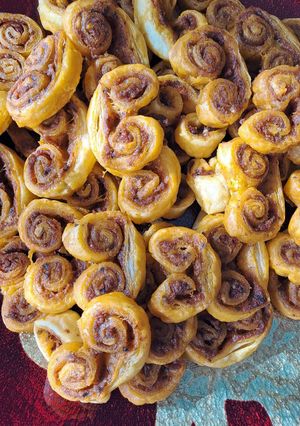 Une photo de Palmiers au pesto rosso