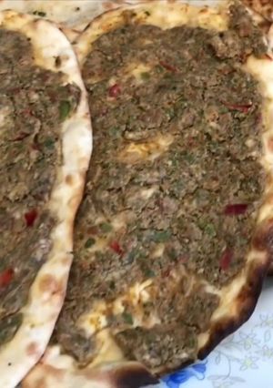 A picture of Chicken Sfiha with Vegetables.