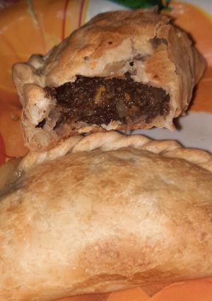 Una foto de Empanadas de morcilla, hongos y anco