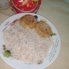A picture of Whole hot spice rice with chicken.