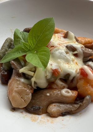 Foto principal de Ñoquis de patata con queso, y setas