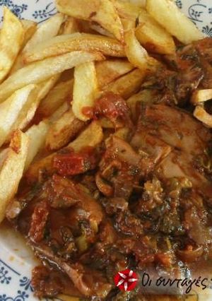 Φωτογραφία της συνταγής Σουπιές με μυρωδικά και κόκκινο κρασί