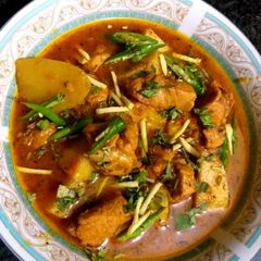 A picture of Aloo gosht.