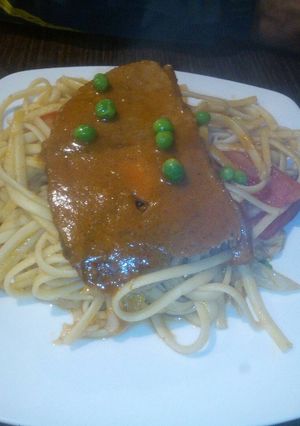 Una foto de Tallarines con asado