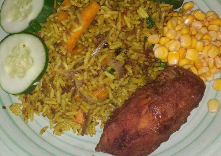Simple Way to Prepare Award-winning Fried rice garnished with sweet corn, cucumber and fried chicken