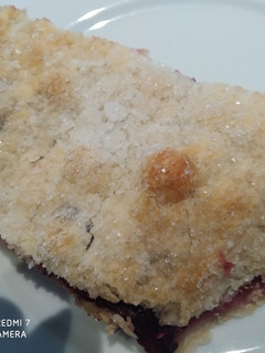 Una foto de Empanada de manzana y arándanos azules
