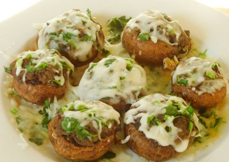 Hummus stuffed chessey mushrooms