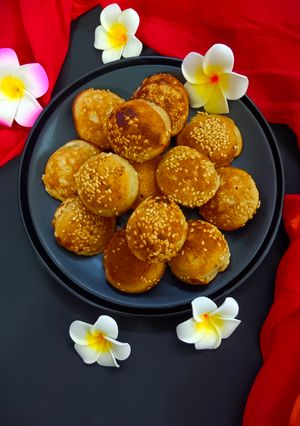 A picture of Delicious Gulgule (Dumplings) in an Appe Pan.