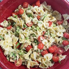 A picture of Pesto Pasta with Grilled Chicken and Broccoli.