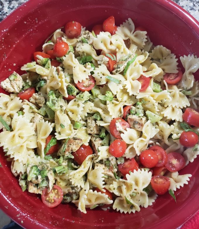 A picture of Pesto Pasta with Grilled Chicken and Broccoli.