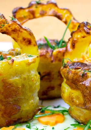 Foto principal de Cestas de patata con bacón y champiñones