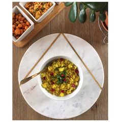 A picture of Aloo Poha - Turmeric flavoured Flattened Rice with Potato.
