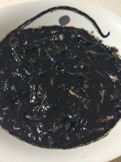 Una foto de Calamares en su tinta