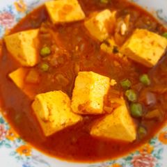 A picture of Matar Paneer.