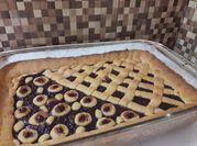 Una foto de pastafrola de dulce de guayaba