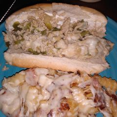 A picture of Chicken steak and cheese subs.