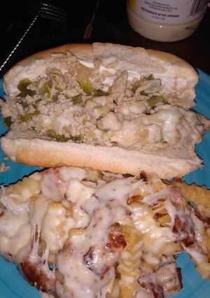 A picture of Chicken steak and cheese subs.
