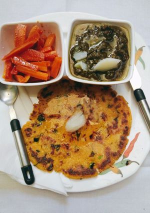 A picture of Sarson ka sag with Makke di roti.