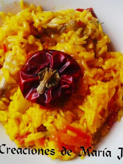 Una foto de Arroz con pollo y ñora