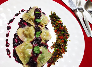 A picture of Ravioli With Purple Sauces.