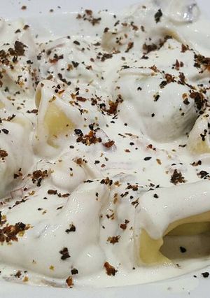 Una foto de Tortelinis de ricota y espinacas con salsa Alfredo