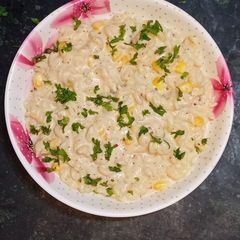Corn cheese pasta in peri peri white sauce A picture of Corn cheese pasta in peri peri white sauce.