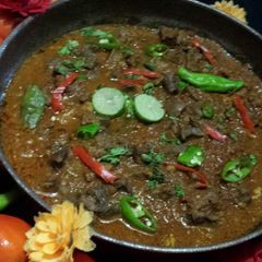 A picture of Katakut mutton masala.