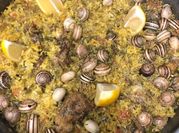 Una foto de caracoles con arroz