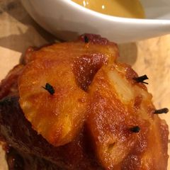 A picture of Spicy pineapple gammon with pineapple sauce.