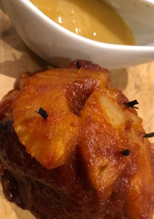A picture of Spicy pineapple gammon with pineapple sauce.