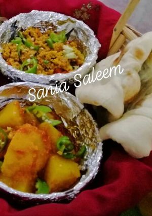 A picture of Khatte Aloo and Hari Mirch Qeema.