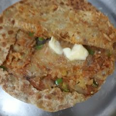 A picture of Aalu Chawal Parantha.