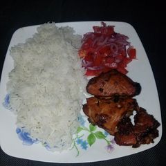 A picture of Chicken glazed with lemon soy sauce and garlic.