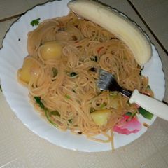 A picture of Fresh spaghetti with banana.