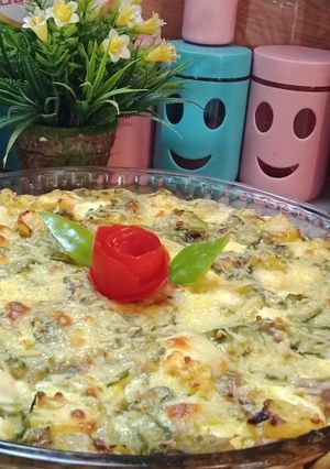 صورة لوصفة غراتان الكوسة (القرعة.الكورجيت)مع البطاطا والجبن لذيذ جداً