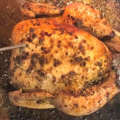 A picture of Oven baked whole chicken.