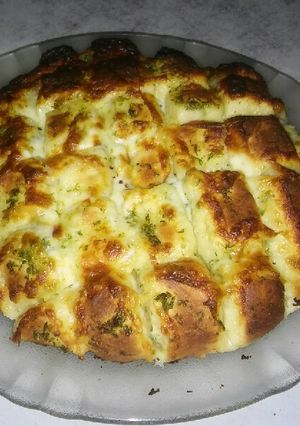 Una foto de Pan de ajo con queso