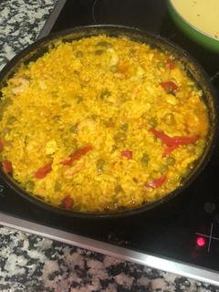 Una foto de Paella