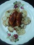 Alitas adobadas con cama de papas al orégano horneadas a la mexicana