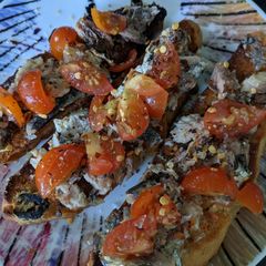 A picture of Mackerel tomato and chilli toast.