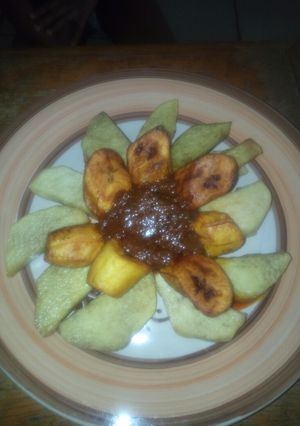 A picture of Fried yam,plantain with stew.