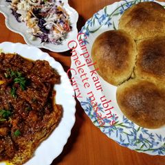 A picture of Omelette masala curry🥚🍅🧅🧄.