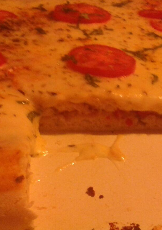 Una foto de Súper pizza rellena