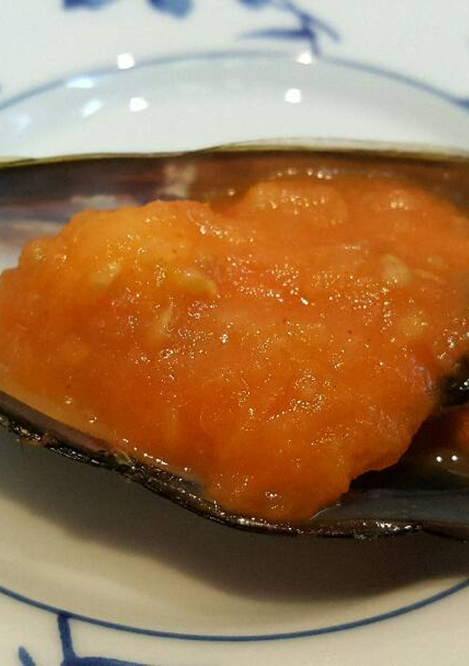 Una foto de Mejillones con tomate